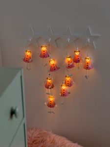 Konstsmide - LED Dekolichterkette, Pinke Engel, mit an/aus Schalter , 10 warm weiße Dioden, 24V Innentrafo, weißes Kabel