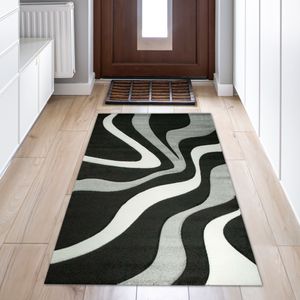 Designer Wohnzimmer Teppich | Wellenmuster | in schwarz grau& weiß Größe - 60x115 cm