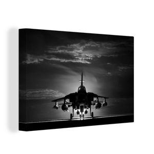 OneMillionCanvasses® - Leinwandbilder - 140x90 cm, Die Silhouette eines Kampfjets bei Sonnenuntergang - schwarz-weiß, Wandbilder Kunstdruck Wanddekoration