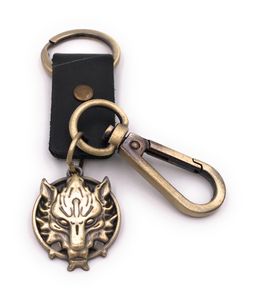 Onwomania Schlüsselanhänger Wolf Wolfkopf böse Raubtier gold Leder Anhänger Keychain