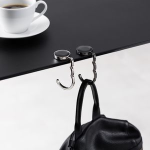 kwmobile Taschenhalter für Tisch - 2x Faltbare Antirutsch Handtaschenhalter Tisch Haken - Taschen Aufhänger - Geschenkidee Gadgets für Frauen - kwmobile Taschenhalter für Tisch - 2x Faltbare Antirutsch Handtaschenhalter Tisch Haken - Taschen Aufhänger - Geschenkidee Gadgets für Frauen -