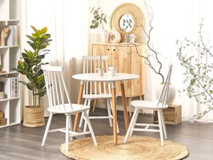 BELIANI Jídelní stůl bílý MDF kulatý ⌀ 80 cm hnědé dřevěné nohy 4-místný skandinávský design