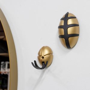 Spinder Design Bug Wandgarderobe mit Metallhaken - Gold/Schwarz