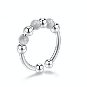 INF Antistresový prsten se 7 otočnými měděnými kuličkami Silver