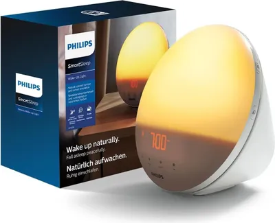 A Philips SmartSleep Wake-up Light and its packaging are shown.
