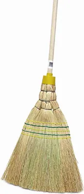 A close-up shot of a broom against a white background.