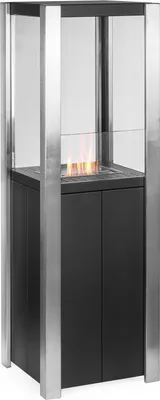 A modern ethanol fireplace with a black base and silver metal frame, featuring glass panels and a visible flame.
