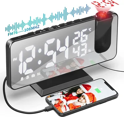A digital alarm clock with a projected display and a smartphone connected to it.