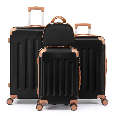 A set of three black suitcases with brown trim and handles, arranged in a line against a white background.