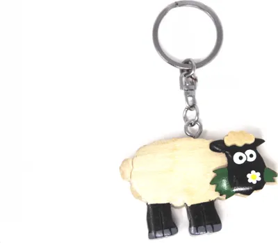 Produktbild von Schlüsselanhänger aus Holz - schwarzes Schaf mit Gras