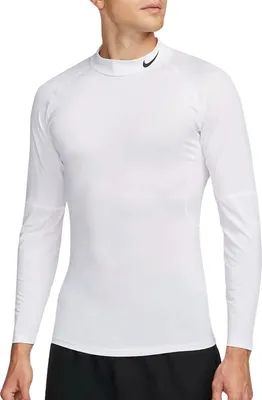A man wearing a white long-sleeved Nike top.