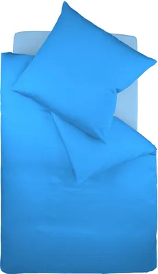 A top-down view of a blue duvet cover and pillow on a light blue sheet.