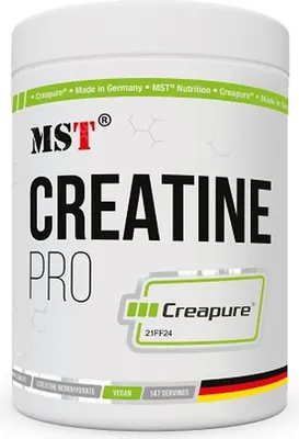 A white tub of creatine powder with product branding and information.