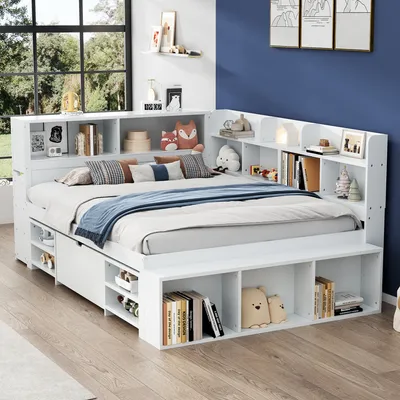 A white bed with built-in storage and bookshelves, styled in a bedroom.