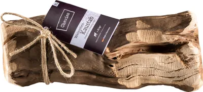 A single piece of wood, likely a chew toy for pets, is presented horizontally against a white background. It is tied with twine and has a tag attached.