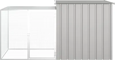 A view of a gray chicken coop with a wire mesh enclosure attached to a solid-sided section.