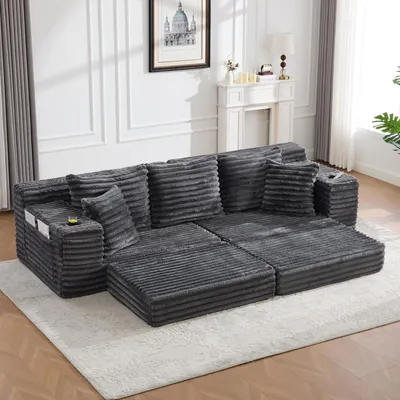 Image de Canapé-lit en velours côtelé gris, à dossier haut et coussins supplémentaires, poches latérales et porte-gobelets, transformable en canapé-lit