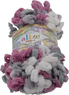 A ball of fluffy yarn with multiple colors.