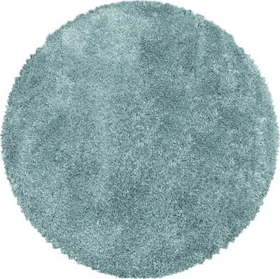 A round, shaggy rug with a blue-gray color.