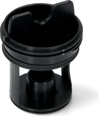 A black washing machine filter part.
