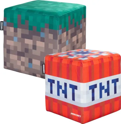Two Minecraft-themed ottomans, one resembling a grass block and the other TNT, are displayed against a white background.