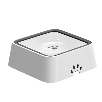 Imagen del producto de Bebedero para perros y gatos de 2 litros. Plato antigoteo para mascotas, color blanco
