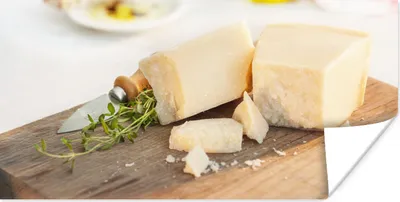 Produktbild von MuchoWow® Poster Parmesankäse auf einem Schneidebrett 80x40 cm - Wanddeko