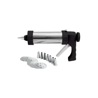 A cookie press with various attachments on a white background.