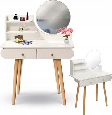 A white wooden vanity table with a round mirror and two drawers, along with a matching stool, displayed against a white background.