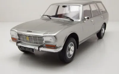 Image de MCG 18358 Peugeot 504 Break Estate 1976 argent 1:18