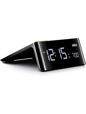 A digital alarm clock is shown on a white background.