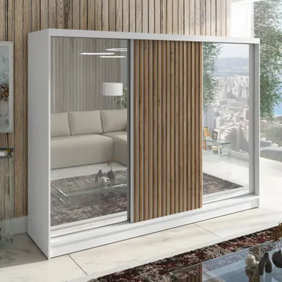A modern wardrobe with mirrored doors and wooden slats, reflecting a living room interior and a city view from a balcony.