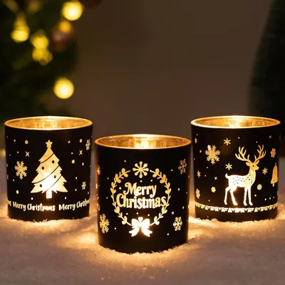 Produktbild von Kerzenständer für Teelichter, Weihnachtsdeko, Set aus 3 n, schwarzen und goldenen Kerzenständern aus Glas mit Motiven von Rentieren, Girlanden und Weihnachtsbäumen