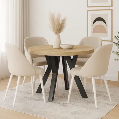 A dining table set in a room with artwork on the wall.