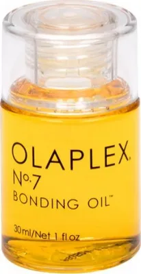 A close-up studio shot of a small bottle of Olaplex No. 7 Bonding Oil.