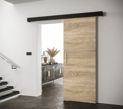 A sliding door in a hallway with stairs and a cabinet in the background.