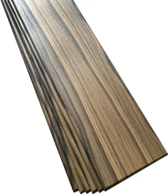 A stack of wooden planks with a dark and light striped grain pattern, arranged diagonally against a white background.