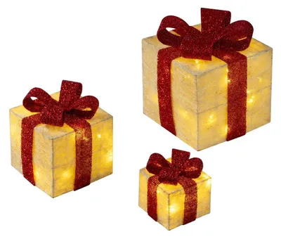 Three illuminated gift boxes with red ribbon bows on a white background.