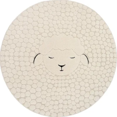 A round rug with a sheep design.