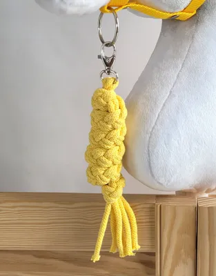Immagine prodotto di Briglia per cavallo giocattolo, realizzata in corda, colore giallo