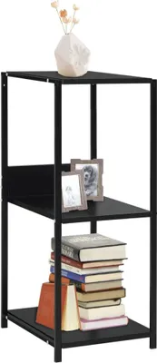 A black three-tiered shelf unit with books and picture frames.