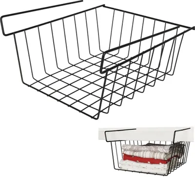 A black metal wire hanging basket is shown from a top-down diagonal angle. A smaller inset image shows the same basket hanging under a shelf and filled with folded textiles.