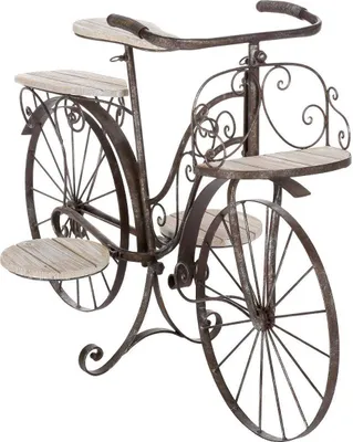A decorative metal and wood plant stand shaped like a bicycle.