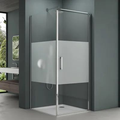 A modern bathroom with a glass shower enclosure.
