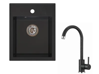 A black granite kitchen sink and a black faucet are shown against a white background.