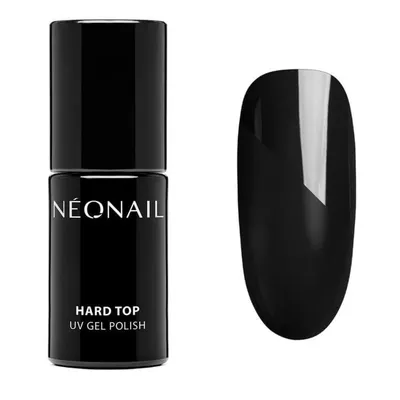 A bottle of black nail polish and a swatch of the polish on a nail.