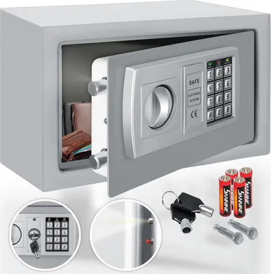 A safe with its door open, showing the interior and the electronic keypad. Accessories like batteries, keys, and mounting bolts are displayed in the foreground.
