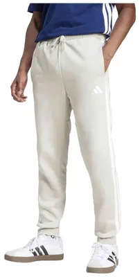 Produktbild von Hose Adidas Essentials 3 Stripes "Beige / White" für Uni