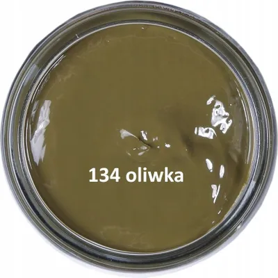 A top-down view of a jar of olive green shoe polish.