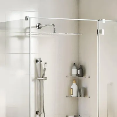 A modern shower with a large square rain shower head and a handheld shower wand.
